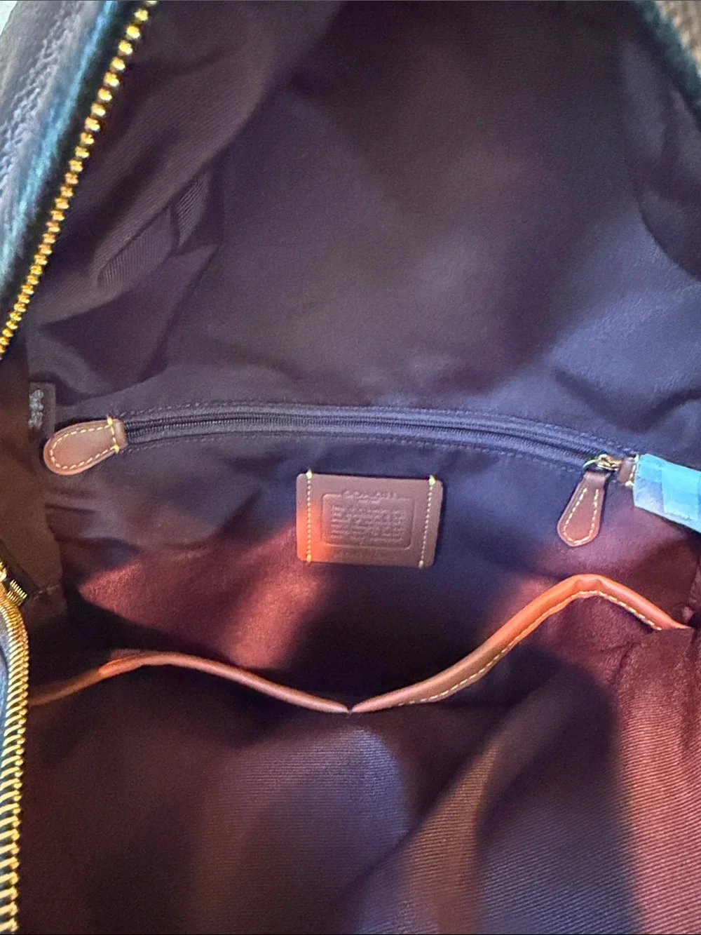 Coach Black Pebbled Leather Backpack with Gold-Tone Accents